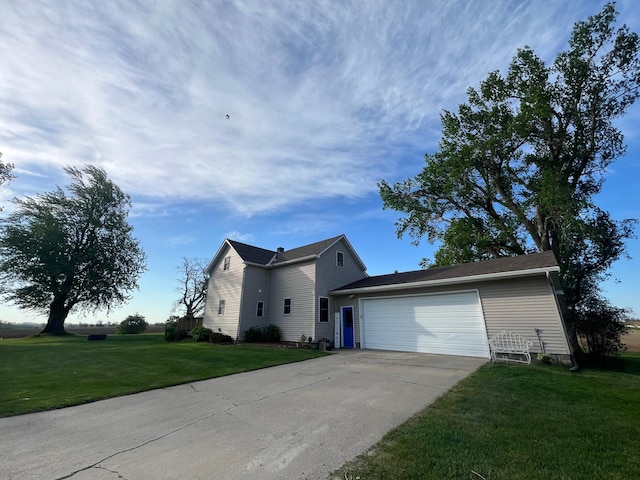 38184 County 47th Blvd, Goodhue, MN 55027 - view of front of house featuring a garage, concrete driveway, and a front yard