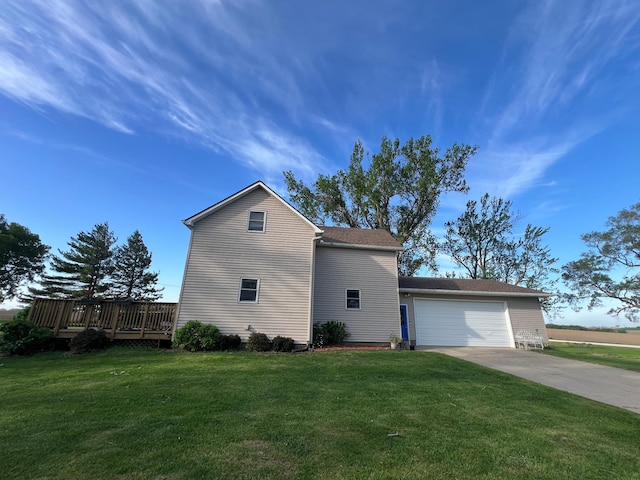 38184 County 47th Blvd, Goodhue, MN 55027 - view of side of home with concrete driveway, a garage, a yard, and a deck