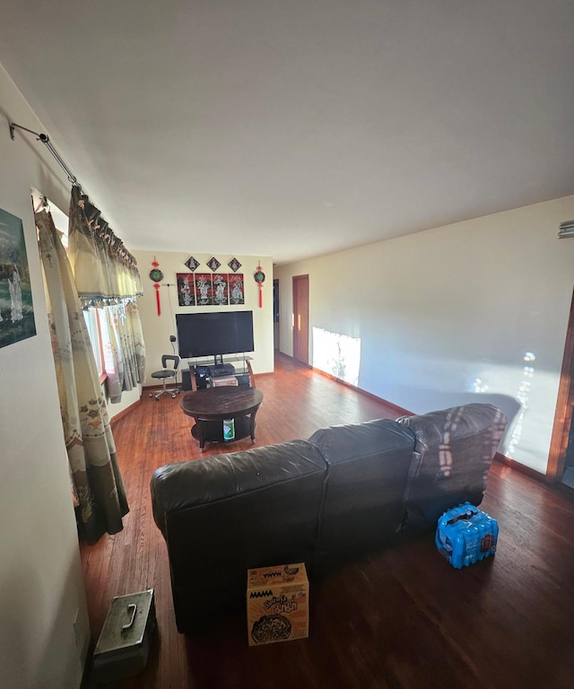 living area with wood finished floors