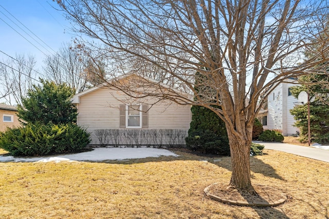 view of home's exterior featuring a yard