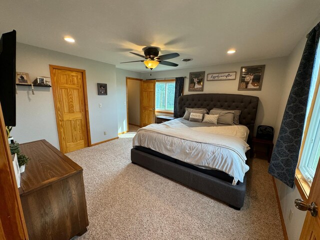 carpeted bedroom with recessed lighting, ceiling fan, and baseboards