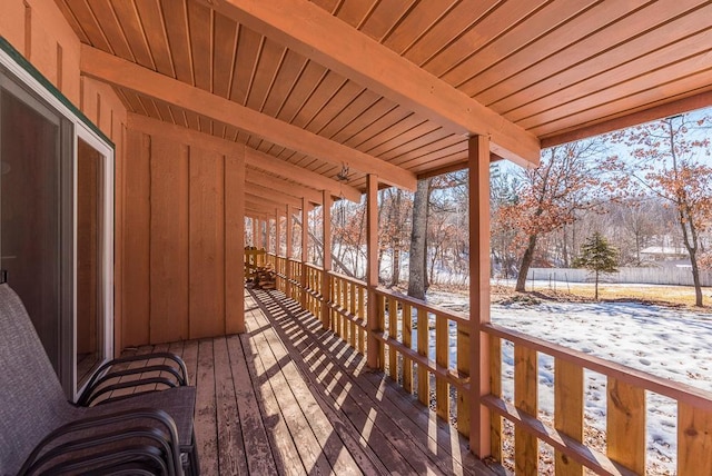 view of snow covered deck