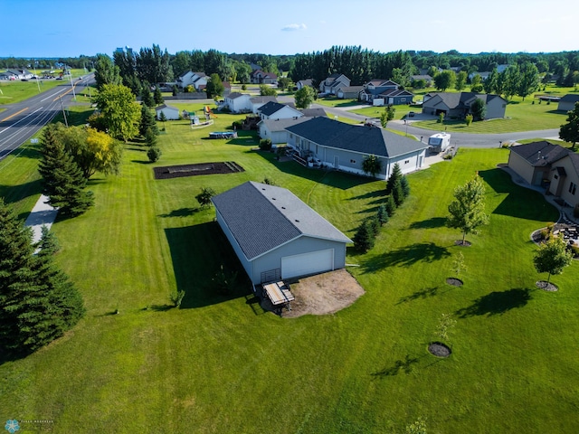 birds eye view of property with a residential view