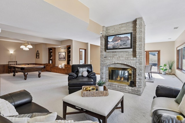 living area featuring a wainscoted wall, light colored carpet, visible vents, a brick fireplace, and billiards