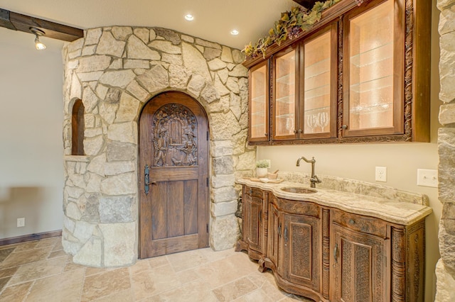 795 140th Ave, New Richmond, WI 54017 - indoor wet bar featuring light stone finish flooring