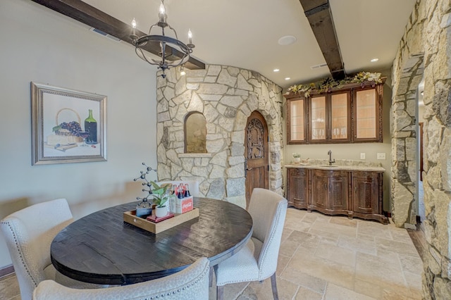 795 140th Ave, New Richmond, WI 54017 - dining area with beam ceiling, a chandelier, stone tile floors, and recessed lighting
