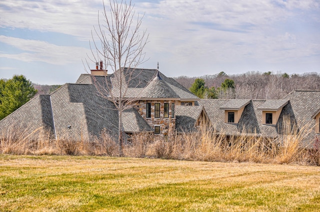 795 140th Ave, New Richmond, WI 54017 - view of property exterior with a lawn, a chimney, and roof with shingles