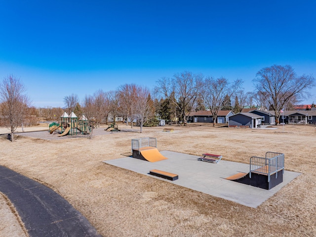 view of yard featuring playground community