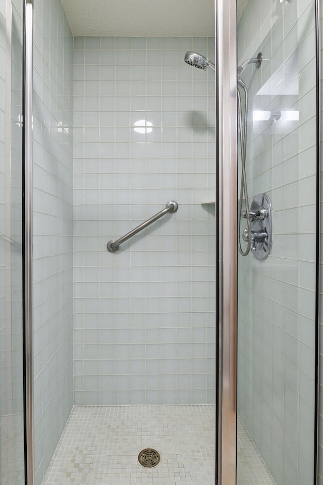 bathroom with a stall shower