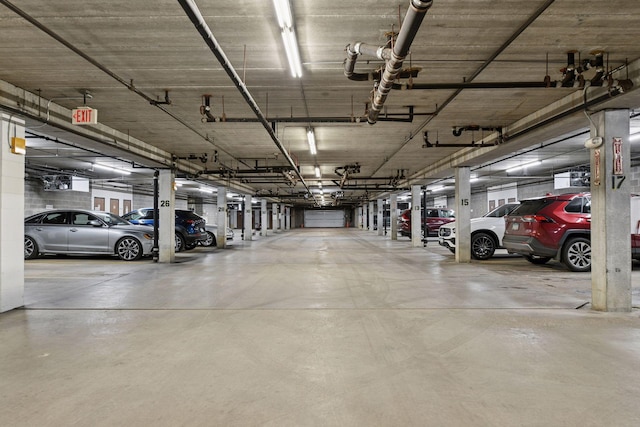 parking garage featuring a garage door opener