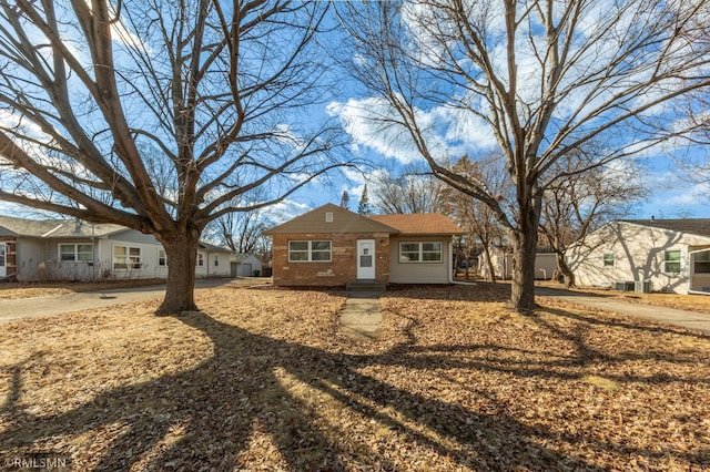 ranch-style home with brick siding