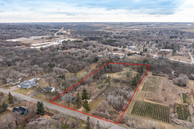 birds eye view of property featuring a rural view