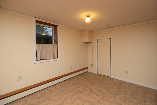 unfurnished room with tile patterned floors, baseboards, baseboard heating, and a textured ceiling