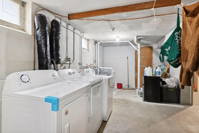 washroom with laundry area and separate washer and dryer