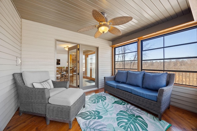 sunroom / solarium with wood ceiling and ceiling fan