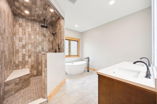 29235 Piney Way, Breezy Point, MN 56472 - full bathroom with a walk in shower, a freestanding bath, double vanity, baseboards, and recessed lighting