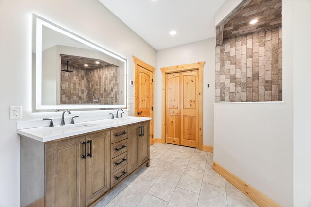 29235 Piney Way, Breezy Point, MN 56472 - full bathroom featuring double vanity, baseboards, tile patterned floors, recessed lighting, and a tile shower