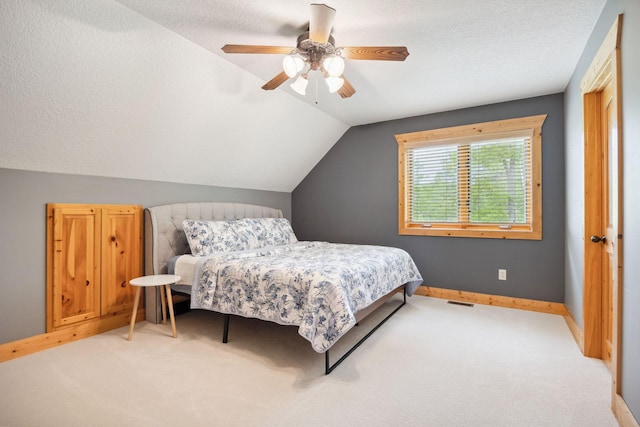 29235 Piney Way, Breezy Point, MN 56472 - bedroom with carpet floors, vaulted ceiling, a ceiling fan, and baseboards