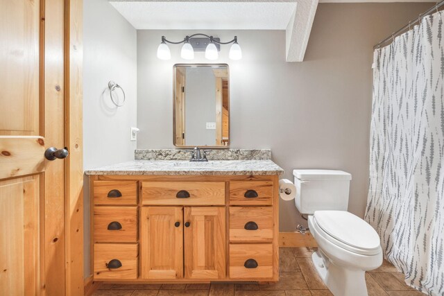 29235 Piney Way, Breezy Point, MN 56472 - bathroom featuring vanity, toilet, tile patterned flooring, and curtained shower