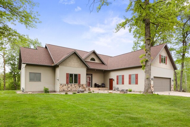 29235 Piney Way, Breezy Point, MN 56472 - view of front facade featuring driveway, a front lawn, and a shingled roof