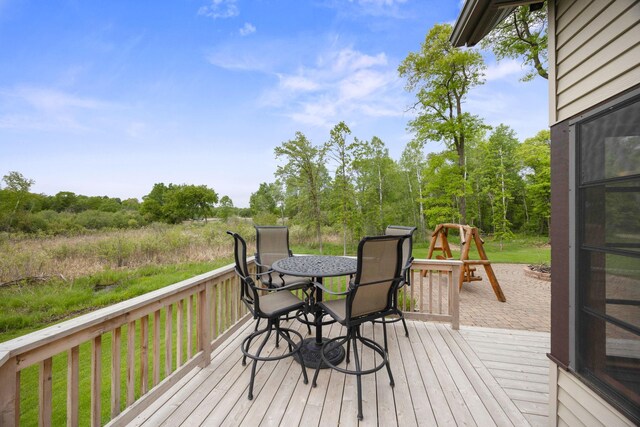 29235 Piney Way, Breezy Point, MN 56472 - wooden deck with outdoor dining space