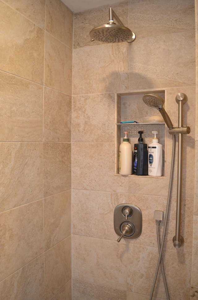 details featuring a tile shower