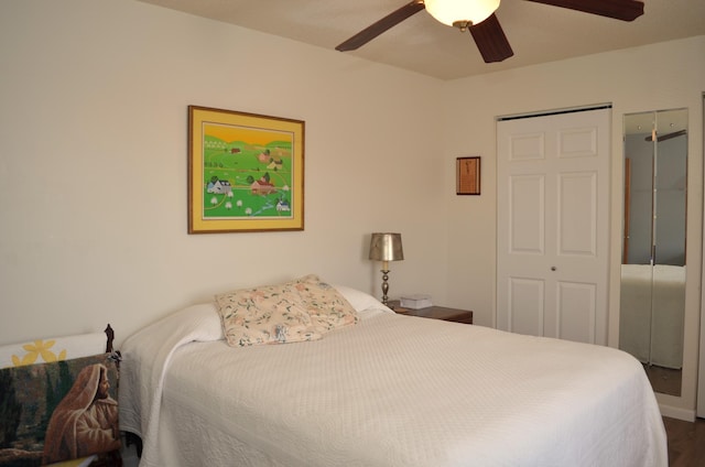 bedroom with a ceiling fan and wood finished floors