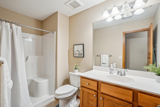 bathroom featuring visible vents, curtained shower, toilet, and vanity