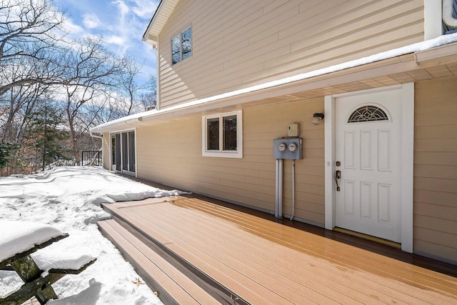 view of snow covered deck