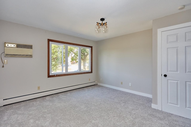 empty room with light carpet, a baseboard radiator, baseboards, and a wall mounted AC