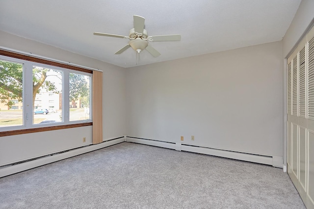 empty room with light carpet and ceiling fan