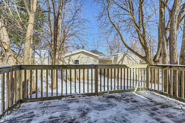 view of snow covered deck