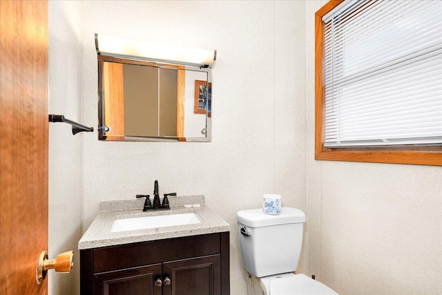 43240 County Highway D, Namakagon Twp, WI 54821 - half bathroom with vanity and plenty of natural light
