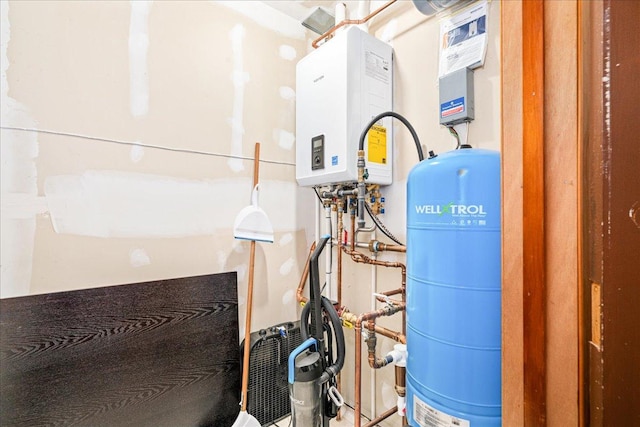 43240 County Highway D, Namakagon Twp, WI 54821 - utility room featuring tankless water heater