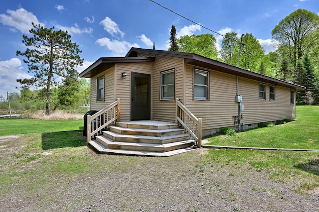 43240 County Highway D, Namakagon Twp, WI 54821 - view of front of property featuring a front yard and crawl space