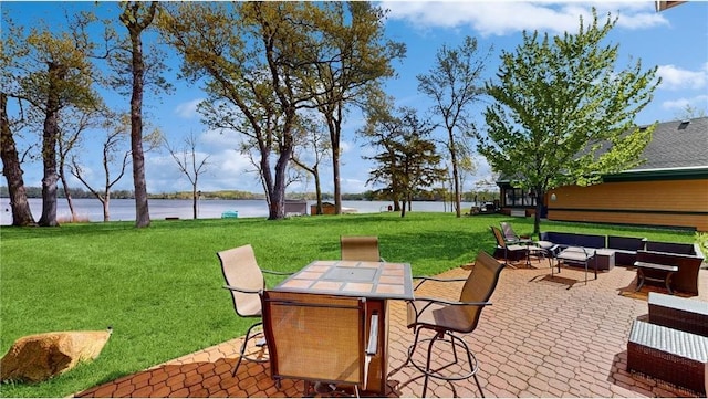 view of patio featuring outdoor dining area, a water view, and outdoor lounge area