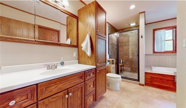 full bath featuring a garden tub, toilet, ornamental molding, a stall shower, and vanity