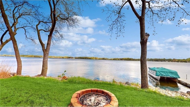 water view with an outdoor fire pit