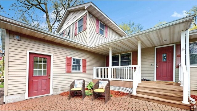 property entrance with a porch