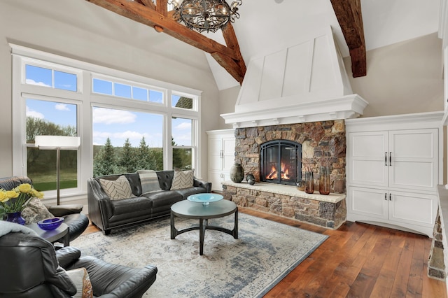 living room featuring high vaulted ceiling, dark wood finished floors, beam ceiling, and a fireplace