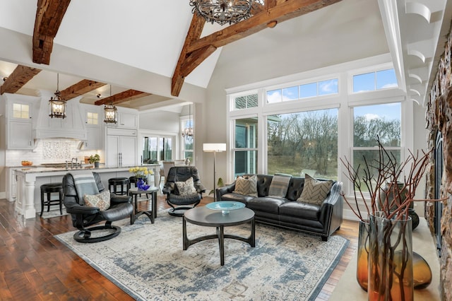 living area featuring dark wood-style floors, a notable chandelier, high vaulted ceiling, and beam ceiling