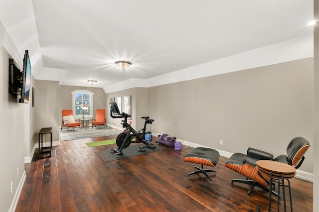 exercise room featuring hardwood / wood-style floors and baseboards