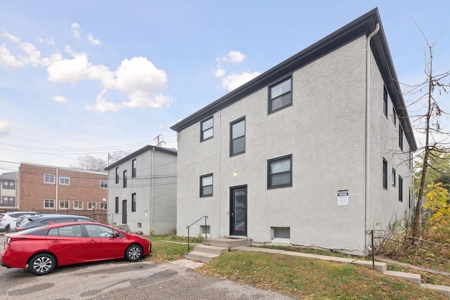 exterior space featuring stucco siding