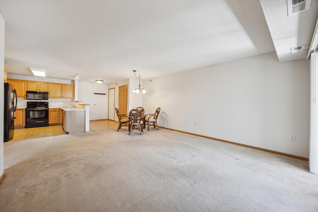 living room with a textured ceiling, baseboards, visible vents, and light carpet