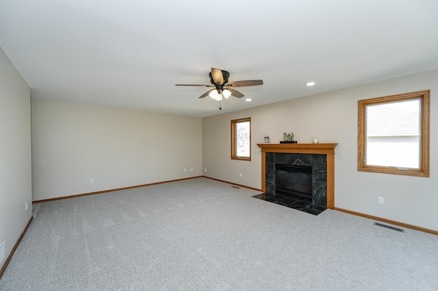 unfurnished living room featuring recessed lighting, baseboards, visible vents, and ceiling fan