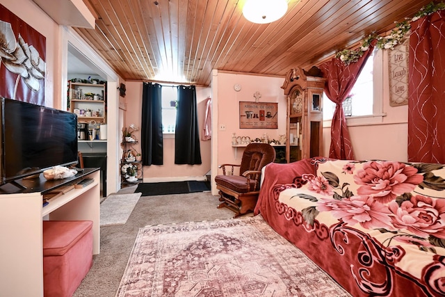 living area featuring carpet floors and wood ceiling