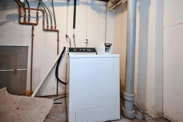 laundry room featuring laundry area and washer / clothes dryer