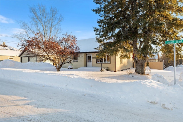 view of front of home with fence