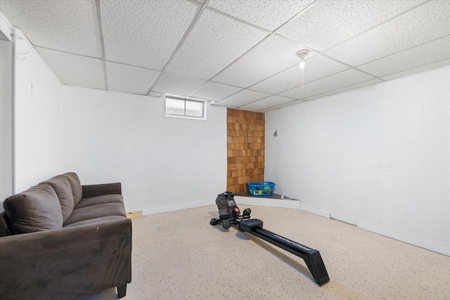 workout room featuring a paneled ceiling