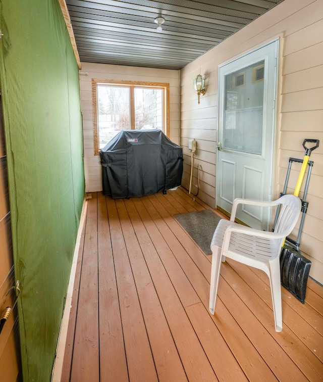 sunroom with wooden ceiling